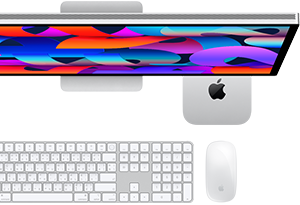Mac mini วางอยู่ใต้ Studio Display, Magic Keyboard พร้อมปุ่มตัวเลข, Magic Mouse