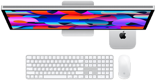 Mac mini วางอยู่ใต้ Studio Display, Magic Keyboard พร้อมปุ่มตัวเลข, Magic Mouse