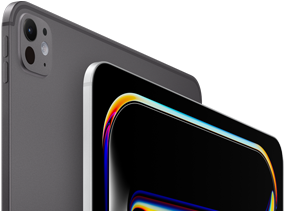 ตัวเครื่องภายนอกด้านหลังของ iPad Pro สีดำสเปซแบล็ค แสดงปุ่มปรับระดับเสียงและระบบกล้องระดับโปร, ตัวเครื่องภายนอกด้านหน้าของ iPad Pro สีเงิน แสดงมุมมนและขอบจอภาพสีดำ, จอภาพแสดงพื้นหลังสีดำที่มีลายเส้นนามธรรมหลากสีสัน